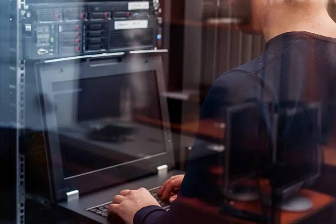 person auditing IT network